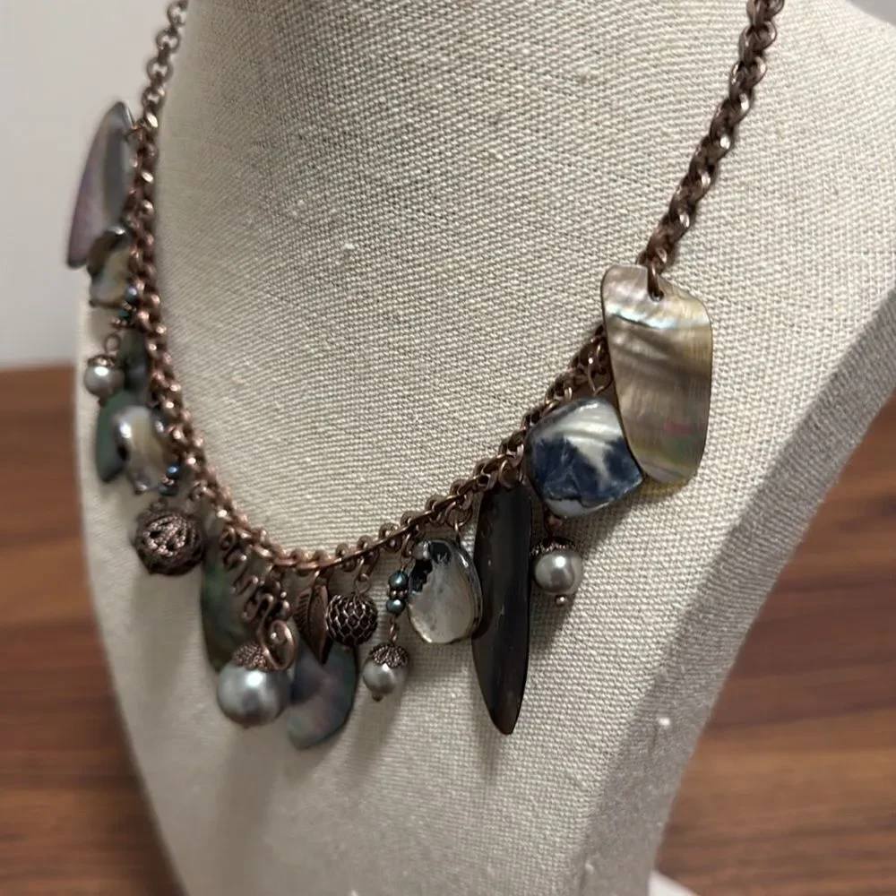 Lia Sophia Signed Bronze necklace with Abalone, Fresh Water Pearls and Charms.